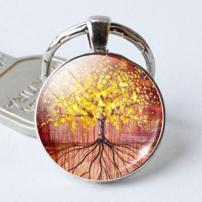 China Metal 2021Europe And America Tree Of Life Time Key Chain Gem Key Pendant Jewelry Creative Gift for sale