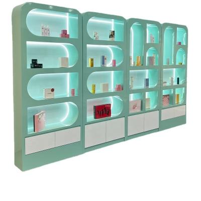 China Man-made board Cosmetics display cabinet paint simple modern special-shaped bag showcase beauty salon Skin Care nail polish display cabinet for sale