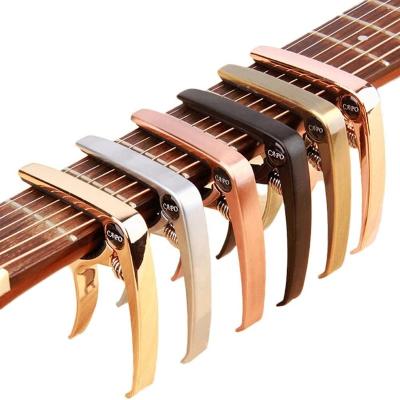 China Colorful Creative Simple Zinc Alloy Guitar Ukulele HOT JOINT GUITAR Capo for sale