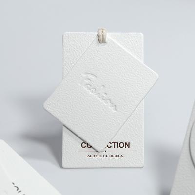 China Recyled Customized Luxury Recycled Label Embossed Hang Tag Special Cardboard Gift Brand Name Hangtags For Clothing Own Logo Tags for sale