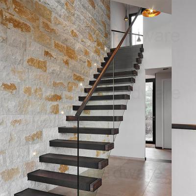 China Modern floating walnut stairs with glass balustrade for sale