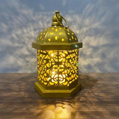 China Retro New Retro Iron Hollow Wind Lamp Horse Lamp Ornaments Moroccan Decorative Atmosphere LED Props Surrounding Lantern for sale