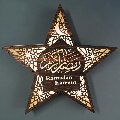 China Retro Wooden Eid Mubarak Wall Lamp Bedroom Living Room Festival 2022 Ramadan Star Shaped Lamp Ramadan Eid Decoration Crafts Pendant for sale