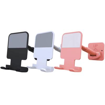 China Wall Mounted Cell Phone Holder Adjustable Cell Phone Holder CaseBuddy Bracket ABS Silicone Wall Mount Kitchen Toiletry for sale