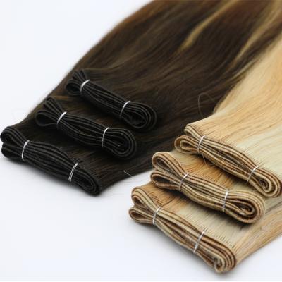 China Right Hand Tied Wefts Hair Extensions Hair Weft Hand Tied Hair Weft Extensions for sale