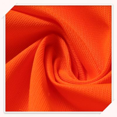 China Waterproof Orange Bright Fluorescent Color Knitted Polyester Fabric Dty Cloth Reflective Fabric For Safety Vest for sale