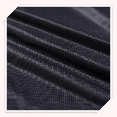 China Wholesale Black Color Waterproof 100% Polyester Knitted Fabrics Plain Windproof Cloth For Casual Wear for sale