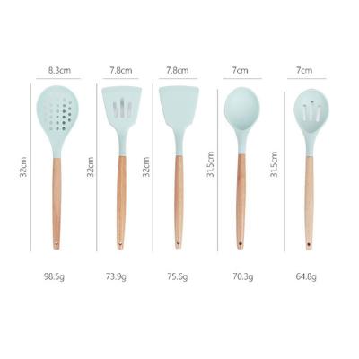 China Hot Selling Morden OEM Products 100% Kitchen Silicone Food Grade Utensils Cooking Tools With Wooden Handle for sale