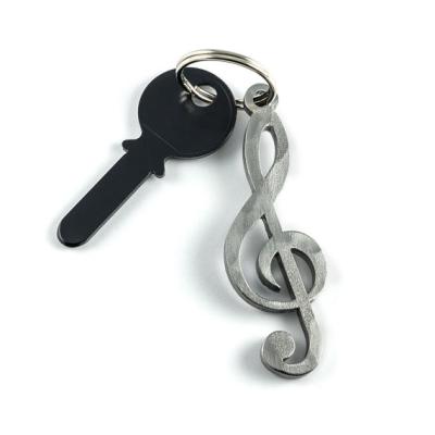 China Custom Die Cut Metal Keychains With Light Gray Hue And Simple Outline for sale