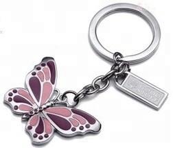 China Custom Promotional Metal Keyrings , Enamel Key Chains Logo Style Can Design for sale