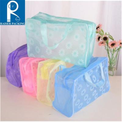 China Hot Selling Recyclable New Make Up Organizer Bag Toiletry Bathing Storage Bag Women Waterproof PVC Transparent Floral Travel Cosmetic Bag for sale