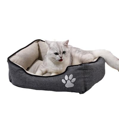 China Viable Wholesale Dog Paw Print Chew Proof Beige Heated Rectangular Luxury Dog Bed for sale