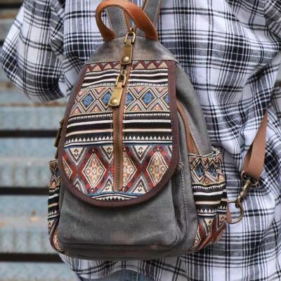 China Water Resistant Vintage Embroidered Canvas Denim Fashion Design Flap Canvas Embroidery Bag Backpack for sale