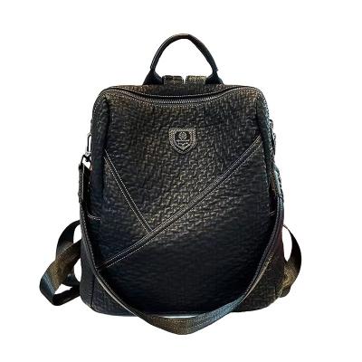 China 2023 new trend PU leather soft genuine leather large capacity women's backpack men's backpack for sale