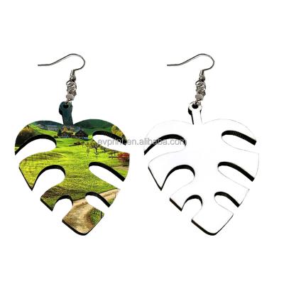 China DIY CLASSIC Double Sided MDF Wire Hook Leaf Earring Sublimation Blank Banana Leaf Printable Earrings for sale