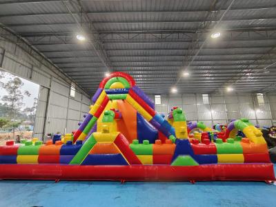 China Commercial  Fireproof Inflatable Slides LEGO Building Block Inflatable Bounce House Castle For Kids for sale