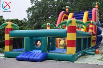 China Customized Giant Inflatable Palm Tree Slides Inflatable Bouncy Castle With Slides for sale