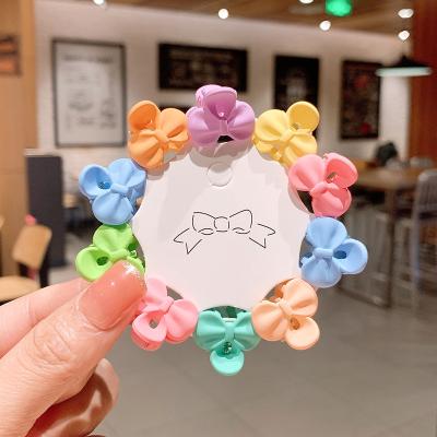 China Sweet Hot Selling Fashion 10pcs Per Card Cute Mini Card Candy Color Flower Heart Shape Children Hair Claw Clips for sale