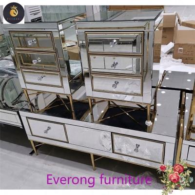 China Modern Luxury Hot Sale New Design Mirrored Bedside Table with Three Drawers Stainless Steel Mirrored Furniture Nightstand for sale