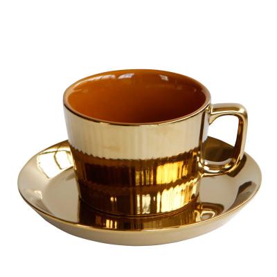 China Durable Light Luxury European Style Electroplating Gold Ceramic Coffee Cups Mug With Saucer Hotel High End Club Dining Utensils for sale