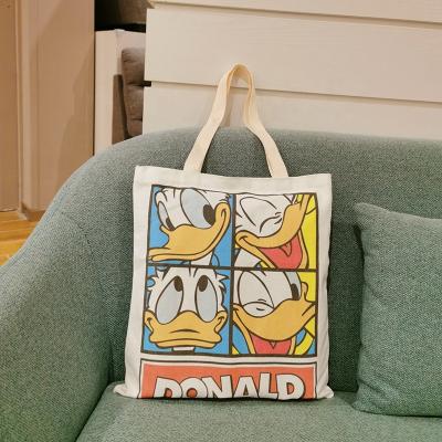 China Eco-Friendly Cotton Canvas Bag Tote Cute Duck Pattern Woven Handle Cotton Canvas Bag With Zipper for sale