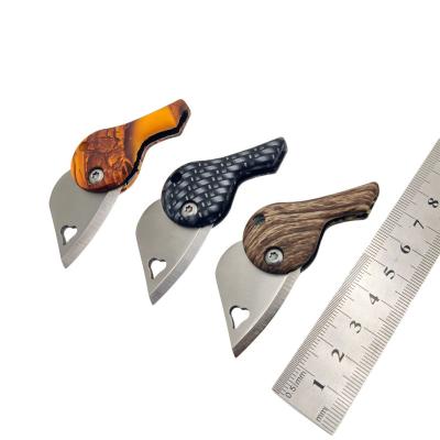 China Non-variable Portable Pocket Folding Mini Pendant Knife Love Shape ABS Handle Decorative Security EDC Tool for sale