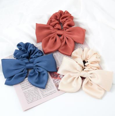 China Fashion Bubble Satin Elastic Hair Scrunchies with Oversized Bow Hair Accessories for Girl and Women for sale