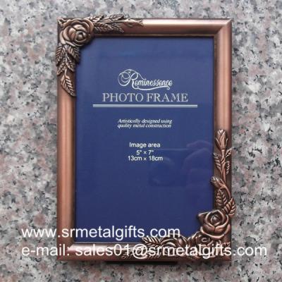 China Metal rose photo frame, ready mold, metal photo frame ornated with rose on the frame for sale