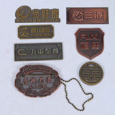 China Custom make metal wine bottle neck tags manufacturer in China for sale