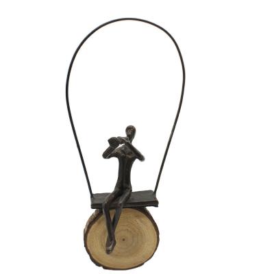 China Europe European Cast Iron Handicraft Swing And Trumpet Music Sculpture For Home Decoration for sale