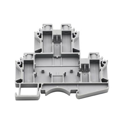 China Plastic/ Copper alloy Plastic Nylon PA66 V0 UK Installation Panel 4mm Mounted Feed Through Screw Cage Din Rail Electric Terminal Block for sale