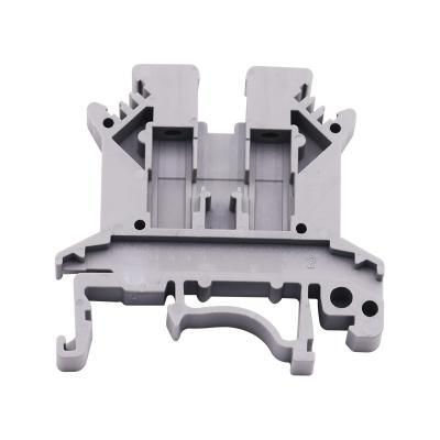 China Plastic/ Copper alloy Factory Price Din Rail Mounted Push In Terminal Blocks UK 24A 800V 0.2-4mm Screw Electric UK Terminal Block for sale