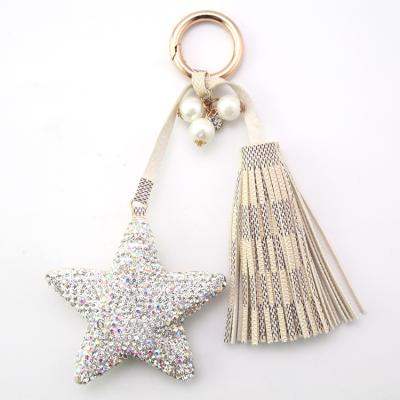 China Beautiful Design Leather Bag Charm PU Tassel Key Chain Diamante Star Shaped Key Chain for sale