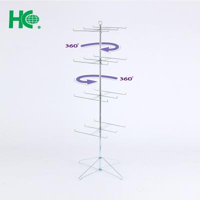 China Rotating Metal Wire 4 Tiers Floor Display Spinner Rotating Rack for sale