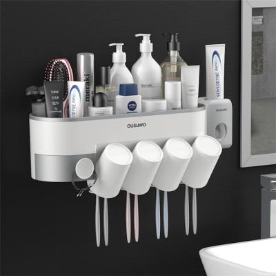 China Sustainable Customized Wall Mounted Toothpaste Vending Machine Plastic Toothbrush Holder With Cups for sale