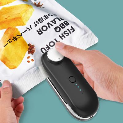 China Portable USB Mini Home Heat Bag Sealer Food Plastic Pouches Vacuum Clean Food Sealing Machine for sale