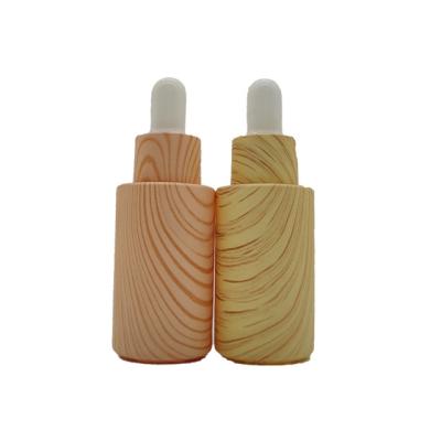 China Small Cosmetic Support Group Customized Wholesale Price With Bamboo Cover Frosted Glass Dropper Essential Oil Bottle for sale