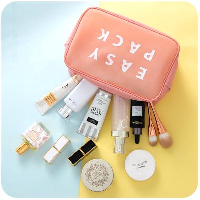 China Fashion Women Candy Cosmetics Lipstick Waterproof Cosmetic Storage Bag Small Size TPU Wash Bag for sale