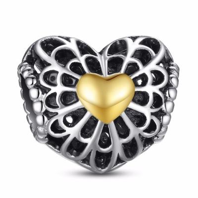 China Vintage Soild Hollow Heart Shaped 925 Sterling Silver Beads With Gold Small Heart for sale