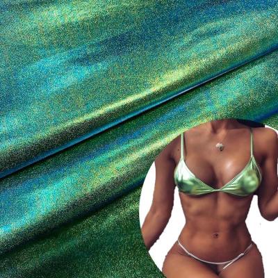 China Free Sample Stretch 200GSM Nylon Shimmer Stretch Swimwear 4 Way Green Shiny Swimwear Fabric for sale