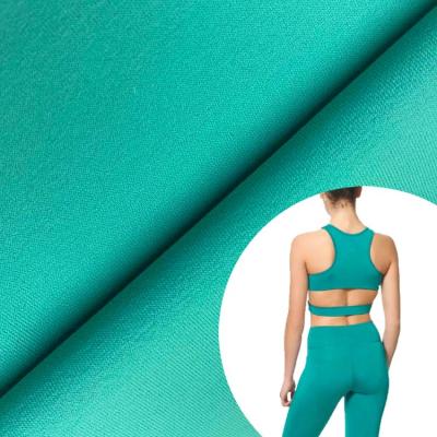 China Stretch 73% Polyester 27% Spandex% Swimwear Yoga Cloth Material Fabric for sale