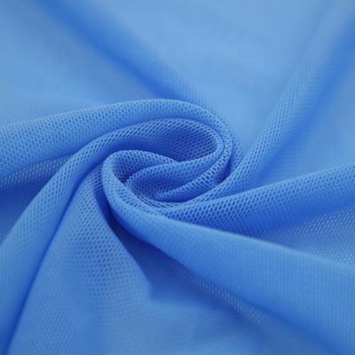 China Simple Wholesale Ultra Light Econyl Spandex Navy Blue Stretch Mesh Fabric for sale