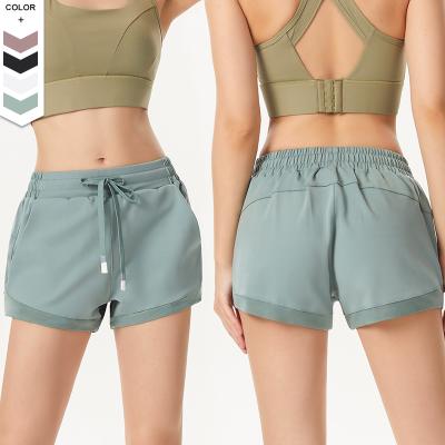 China Essential Breathable Sports Workout Yoga Shorts High Waisted Gym Short Pants Running Biker Shorts With Side Pockets For Women for sale