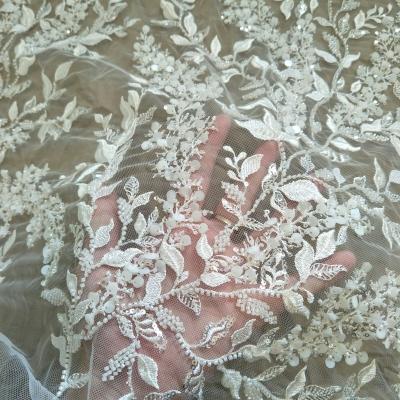 China Other fashion beaded wedding dress lace flower lace fabric 130cm width lace big sale by the yard for sale