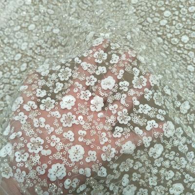 China Other Fashion Wedding Dress Gown Lace Fabric With Pearls And 3D Sequins Beading Flower Lace 130cm Width Sale By The Yard for sale