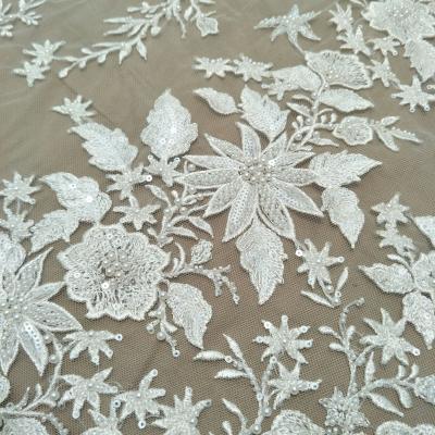 China Other fashion star lace fabric with pearls embroidery wedding dress lace fabric bridal lace sale by the yard for sale