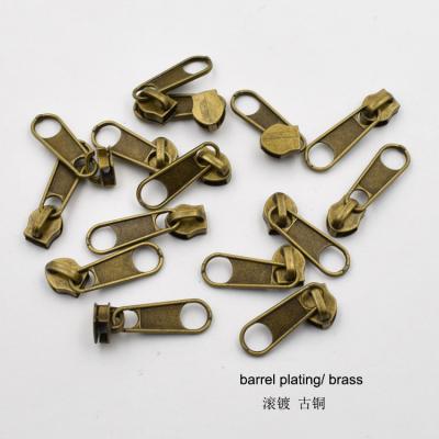 China Custom Long 5# Gold Brass Color Zipper Puller Slider Metal Puller Nickel Free Silver Metal Zipper Puller for sale