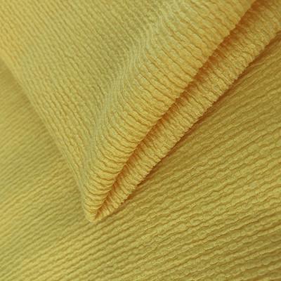 China Stretch In Stock Metallic Colored Pleated Crepe Foil Fabric For Ladies Summer Dress for sale