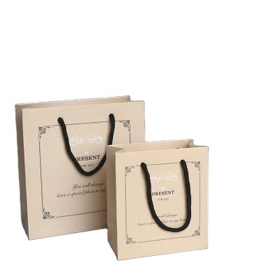 China Recycled Bagspaper Bagtote Bagskorean Version Fashion Gift Materials Wholesale Simple Spot Corporate Personal Style Printing Advertising for sale