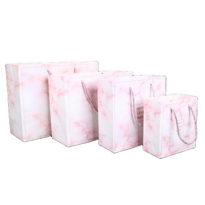 China Paper Bags Handmade Stock Marble Souvenirs White Pink Cardboard Gift Bags Packaging Gift Bags Free Samples for sale